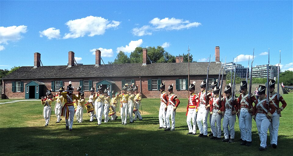 Costumed heritage interpreters at a historic site